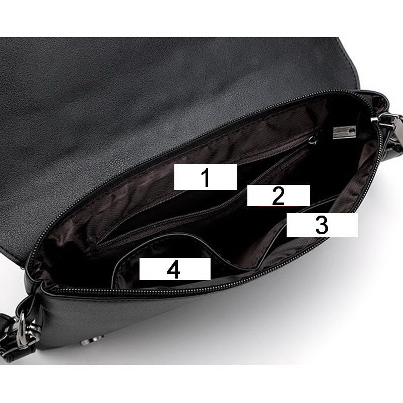 Interior view of a women's evening clutch bag showing multiple compartments and pockets for organized storage.