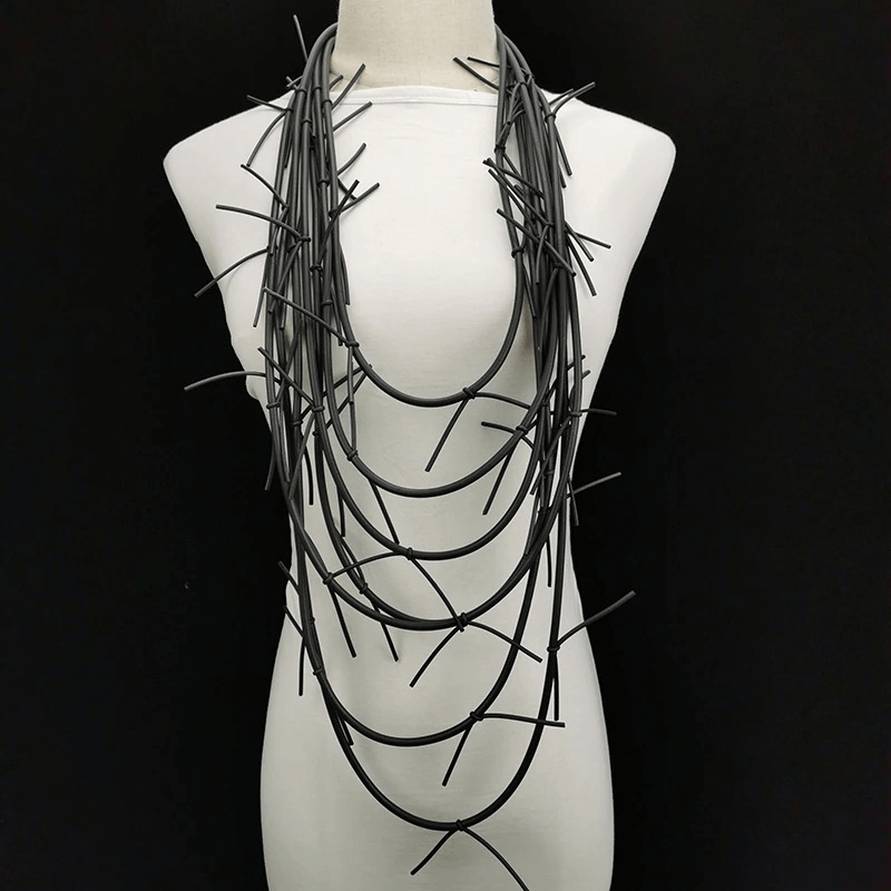 Exquisite long black necklace made of silicone, perfect for adding gothic flair to any outfit.