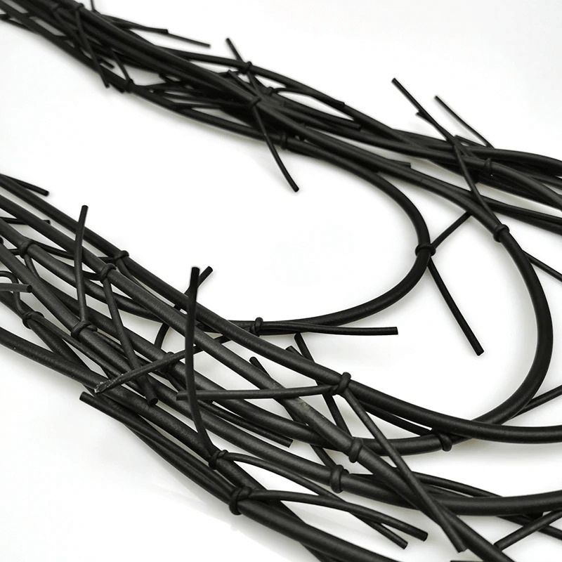 Long black gothic necklace with elegant silicone strands for women’s fashion.