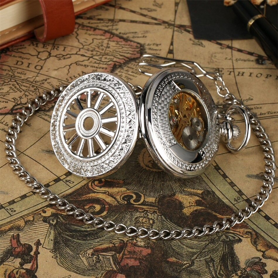 Exquisite mechanical pocket watch with chain on vintage map, showcasing retro design and intricate details.