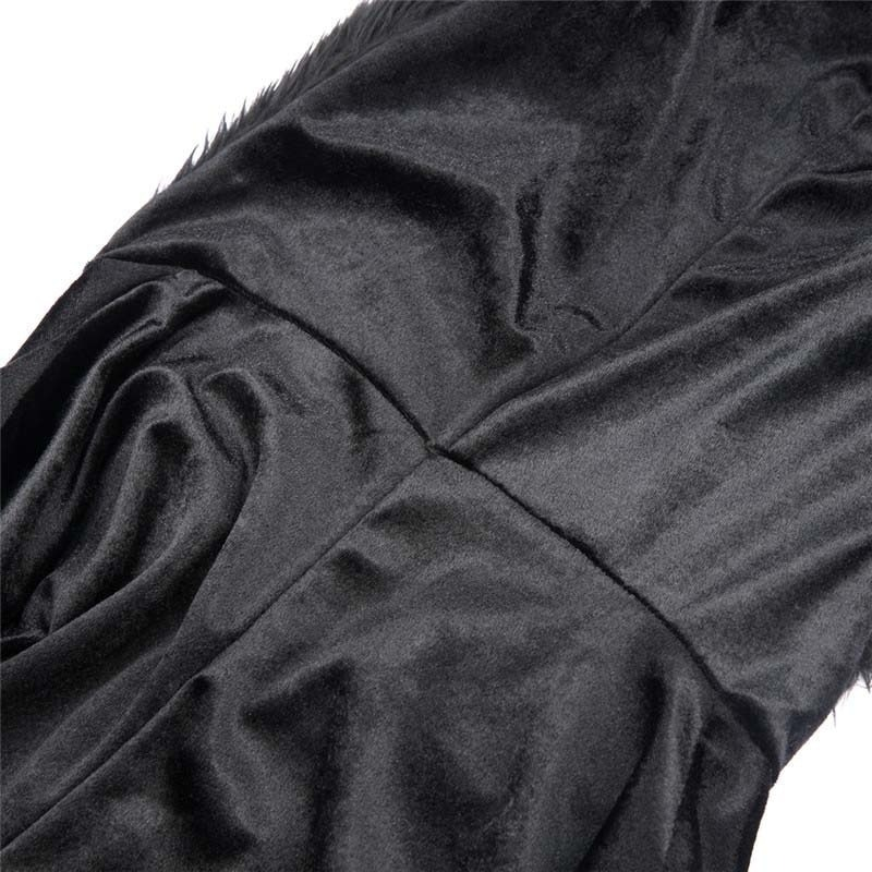 Close-up of the luxurious black fabric of a women's vampire bat costume with fur inserts for Halloween.