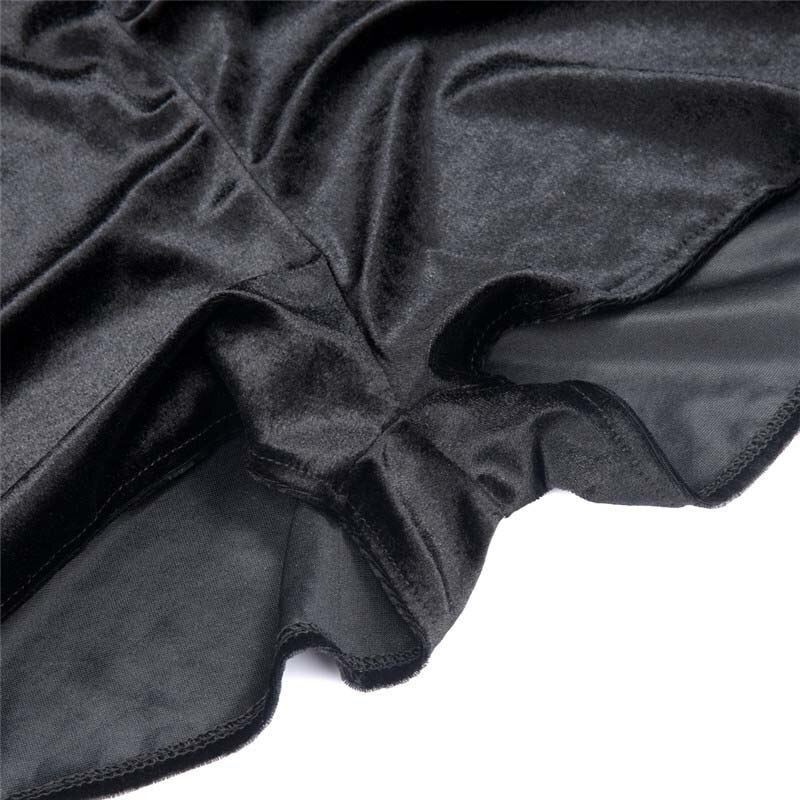 Close-up of luxurious black velvet fabric for women's vampire bat costume, perfect for Halloween celebrations.