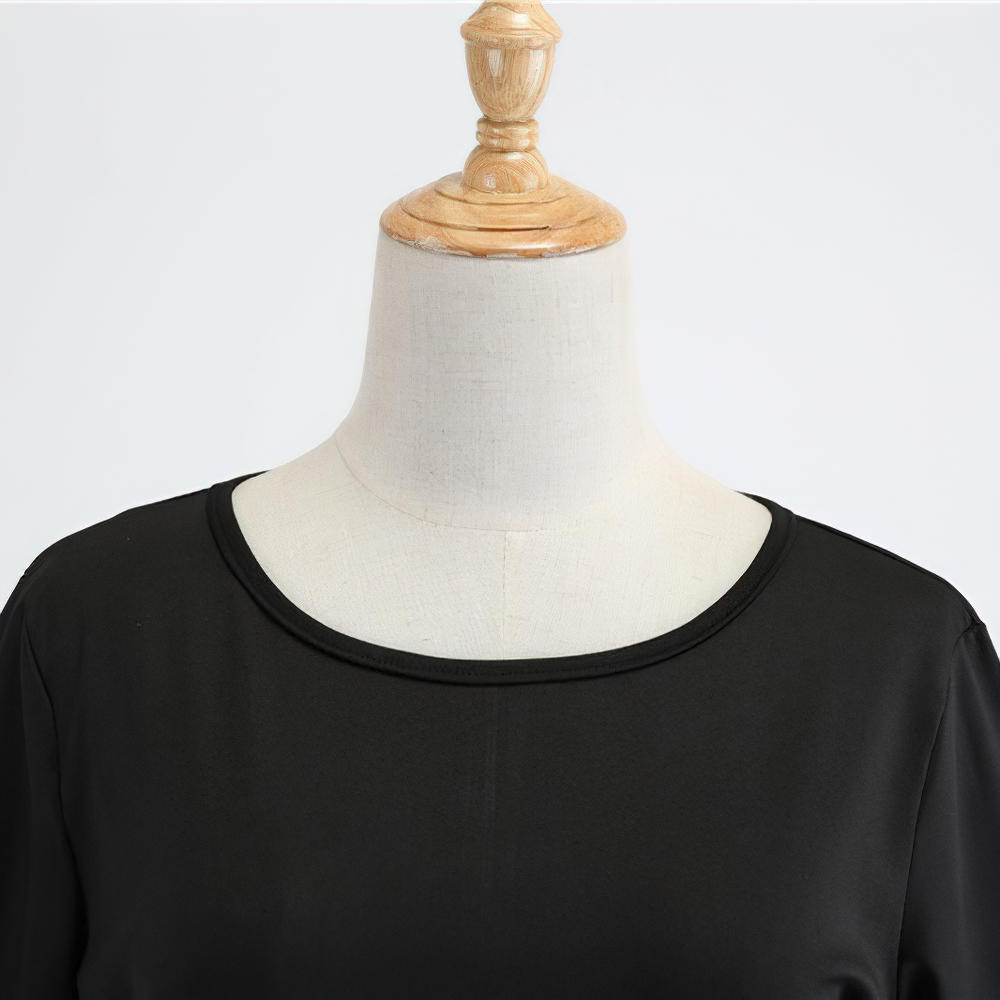Close-up of the neckline of a Fantastic Women's Halloween Dress in black fabric, showcasing elegant design and craftsmanship.