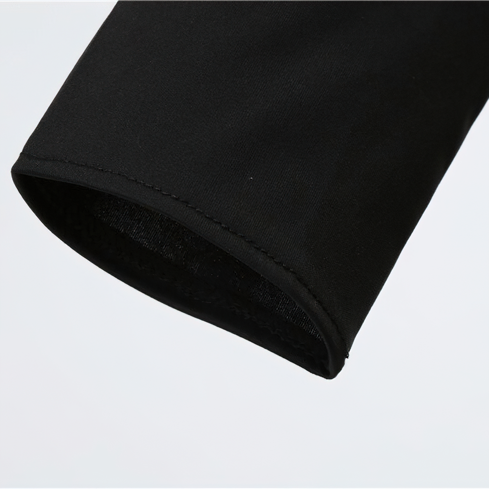 Close-up of the sleeve hem of a women's black Halloween dress, showcasing stylish and elegant fabric finish.