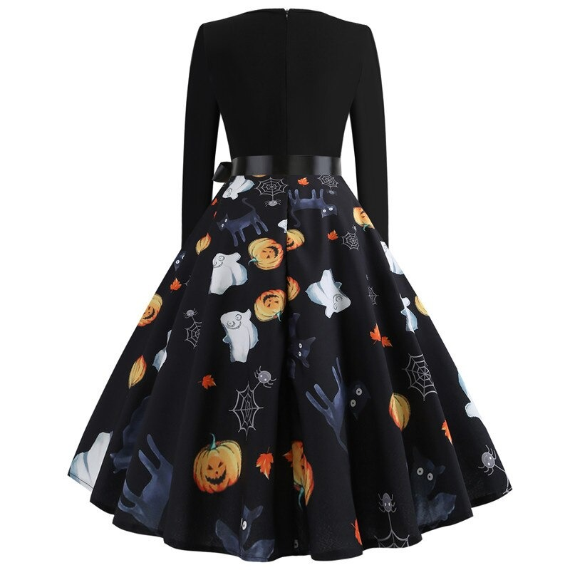 Elegant women's Halloween dress with pumpkin and ghost print, long sleeves, and a stylish black waist belt.