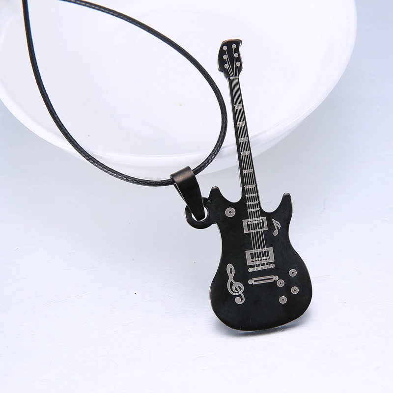 Trendy black guitar necklace pendant on a simple chain, perfect casual jewelry for music lovers.