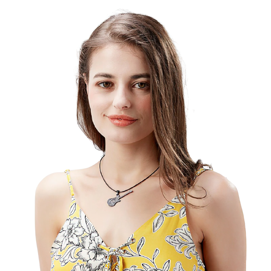 Fashionable woman wearing a 316L stainless steel guitar necklace with a floral yellow top.