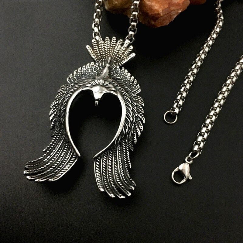 Stunning phoenix pendant made of stainless steel, showcasing intricate retro design, perfect for unisex fashion.