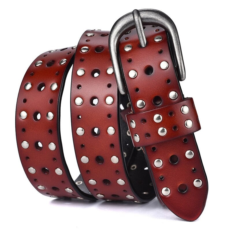 Fashionable women's leather belt with silver rivets and buckle, perfect for casual outfits and available in multiple colors.