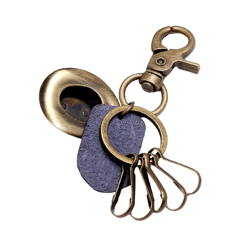 Vintage alloy keychain featuring multiple design elements and a unique hat pendant for car lovers.