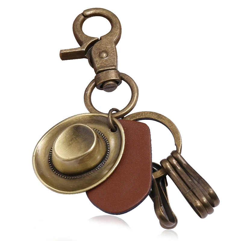 Vintage alloy keychain featuring hat pendant, perfect accessory for car lovers and keyring collectors.