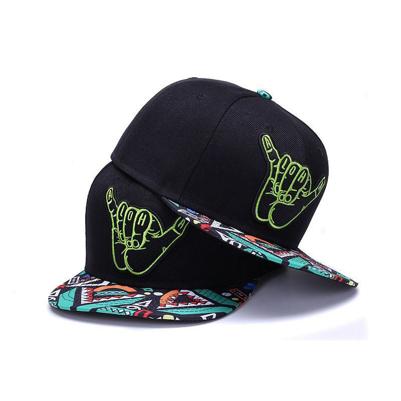 Unisex alternative style cap featuring vibrant retro prints and adjustable snapback for a perfect fit.