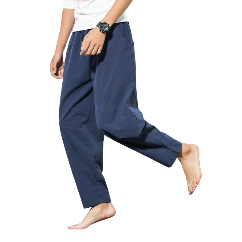 Fashionable autumn men's linen harem pants in navy, featuring a loose fit and comfortable drawstring waist.