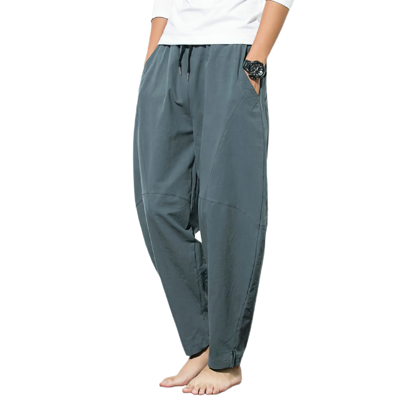 Stylish men's linen harem pants in casual loose fit, featuring drawstring and pocket for comfort and fashion.