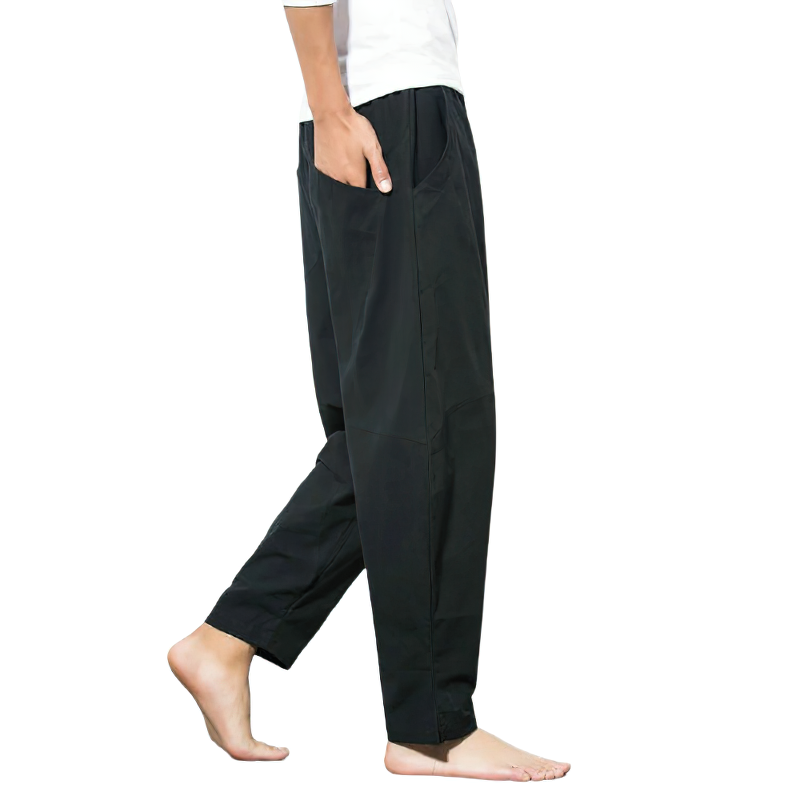 Men's black linen harem pants with pockets, perfect for casual autumn wear and ultimate comfort.