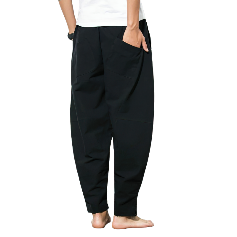 Men's black linen harem pants with pockets, perfect for casual autumn wear and unmatched comfort.