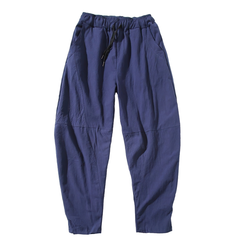 Men's casual loose linen harem pants in navy, featuring an elastic waistband and relaxed fit for ultimate comfort.