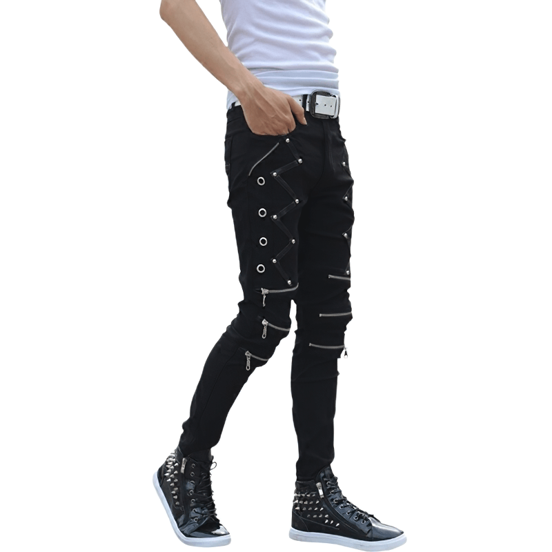 Stylish man wearing black elastic skinny jeans with zippers and rivets, perfect for a biker look.