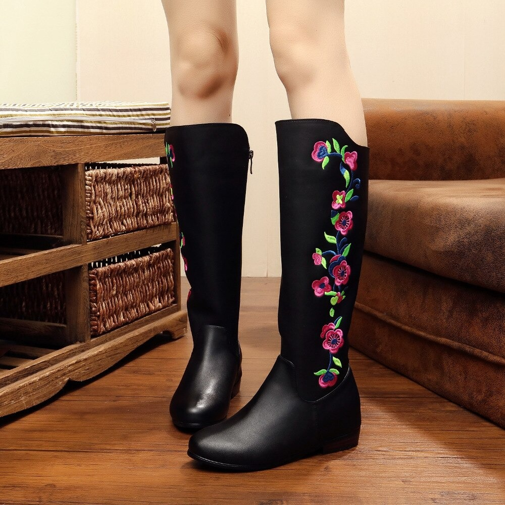 Fashion black mid calf PU leather boots with vibrant flower embroidery, stylish and warm for women's casual wear.