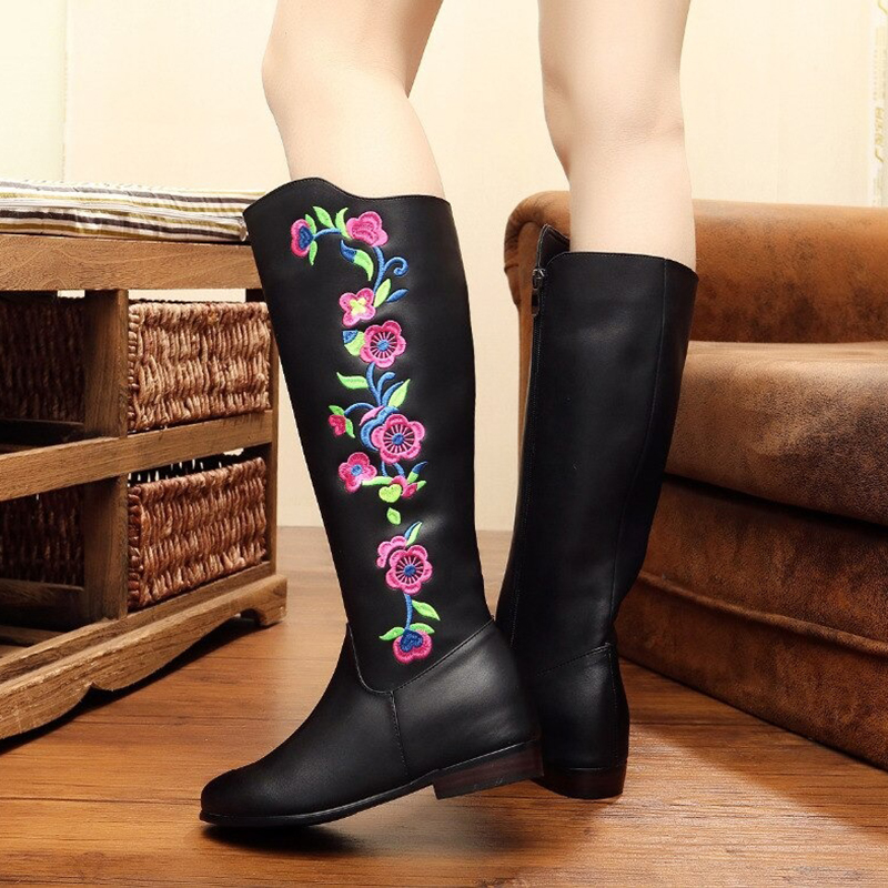 Elegant black mid-calf PU leather boots with colorful flower embroidery, perfect for stylish and casual looks.