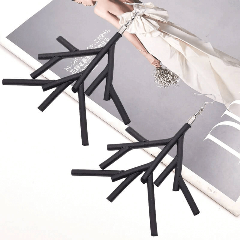 Handmade black rubber gothic earrings with stylish branch design, perfect for women's fashion accessories.