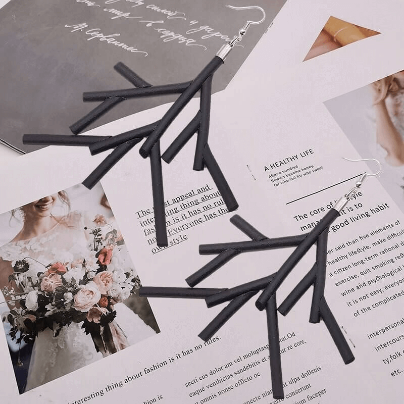 Handmade gothic black rubber earrings with stylish design, perfect for women's fashion accessories.