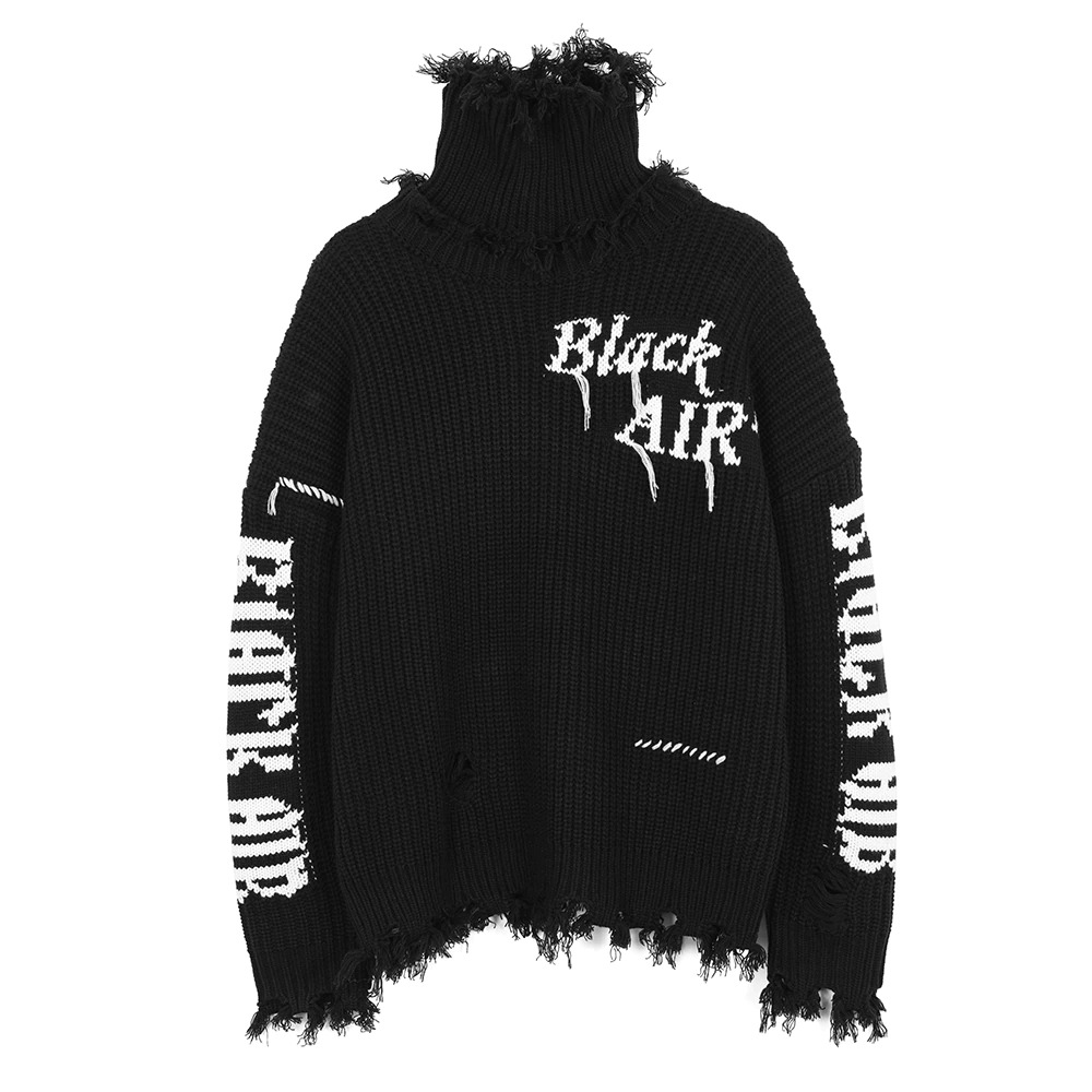 Fashionable oversized black women's turtle neck sweater with distressed details and gothic street style print.