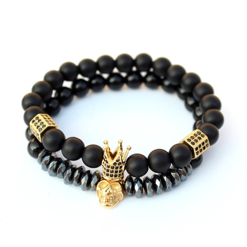 Gothic unisex fashion bracelet set featuring matte stone beads with crown and skull charms.