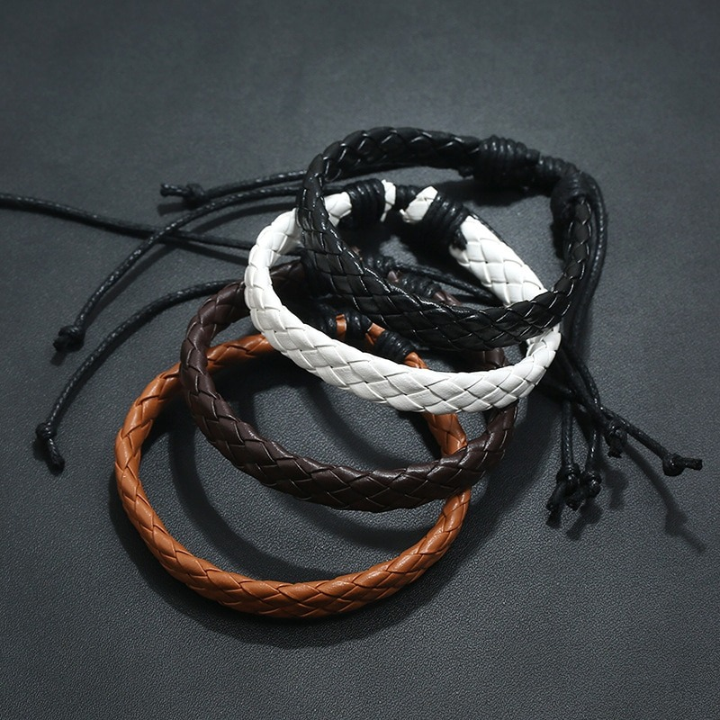 Stylish punk braided leather bracelets in various colors: brown, white, black, and tan, perfect handmade accessories.