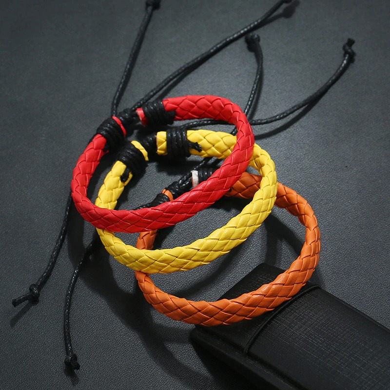 Colorful braided leather bracelets in punk style – handmade unisex accessories for edgy fashion.