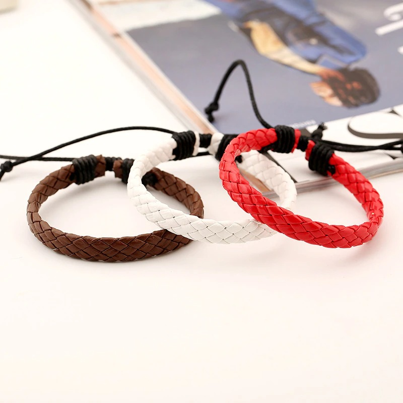 Fashion braided leather bracelets in brown, white, and red, showcasing a punk style unisex accessory.