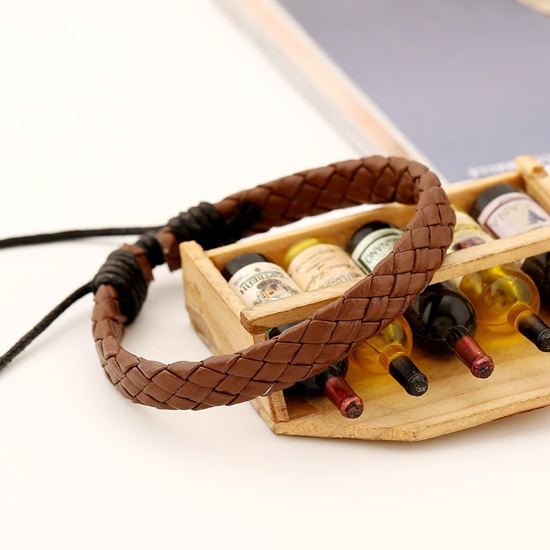 Handmade brown braided leather bracelet in punk style, perfect for unisex fashion accessories and a stylish touch.