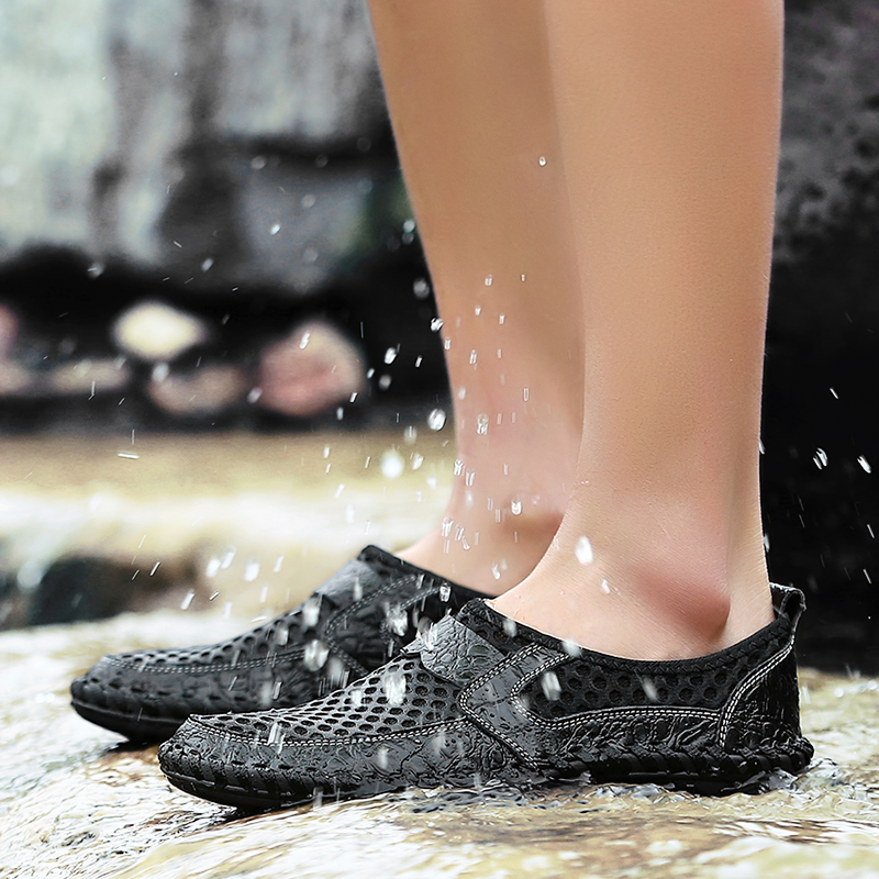 Men's breathable Italy loafers splashing through water, perfect for summer casual outfits.