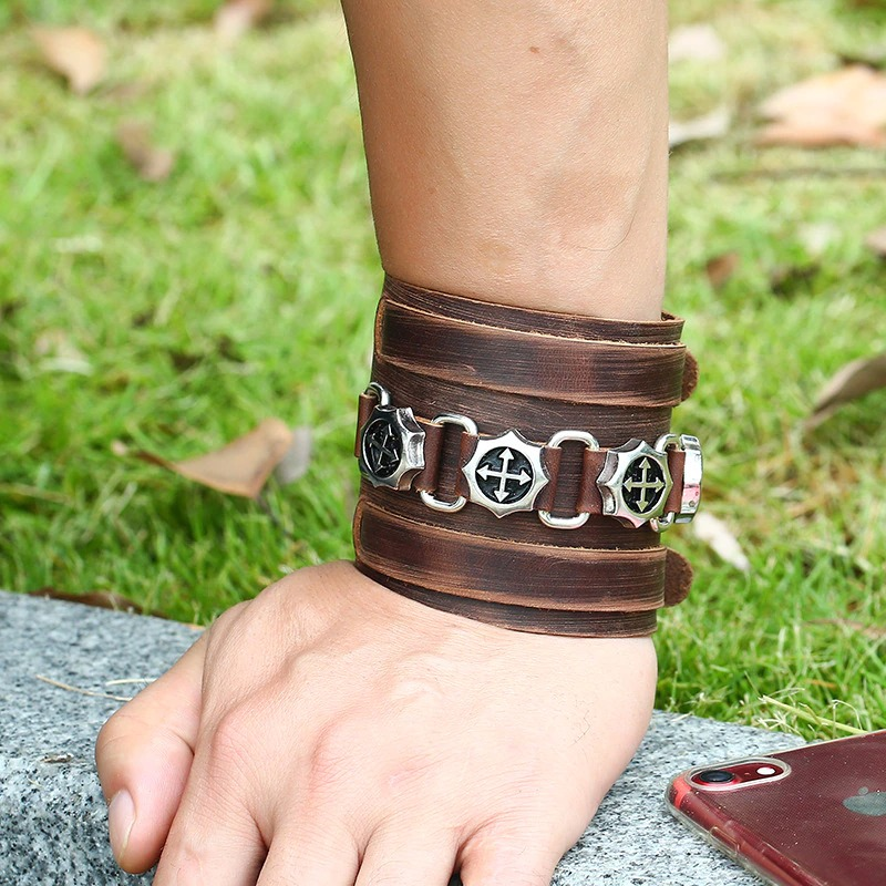 Fashion brown wide genuine leather bracelet with silver pendants, perfect for punk style outfits.