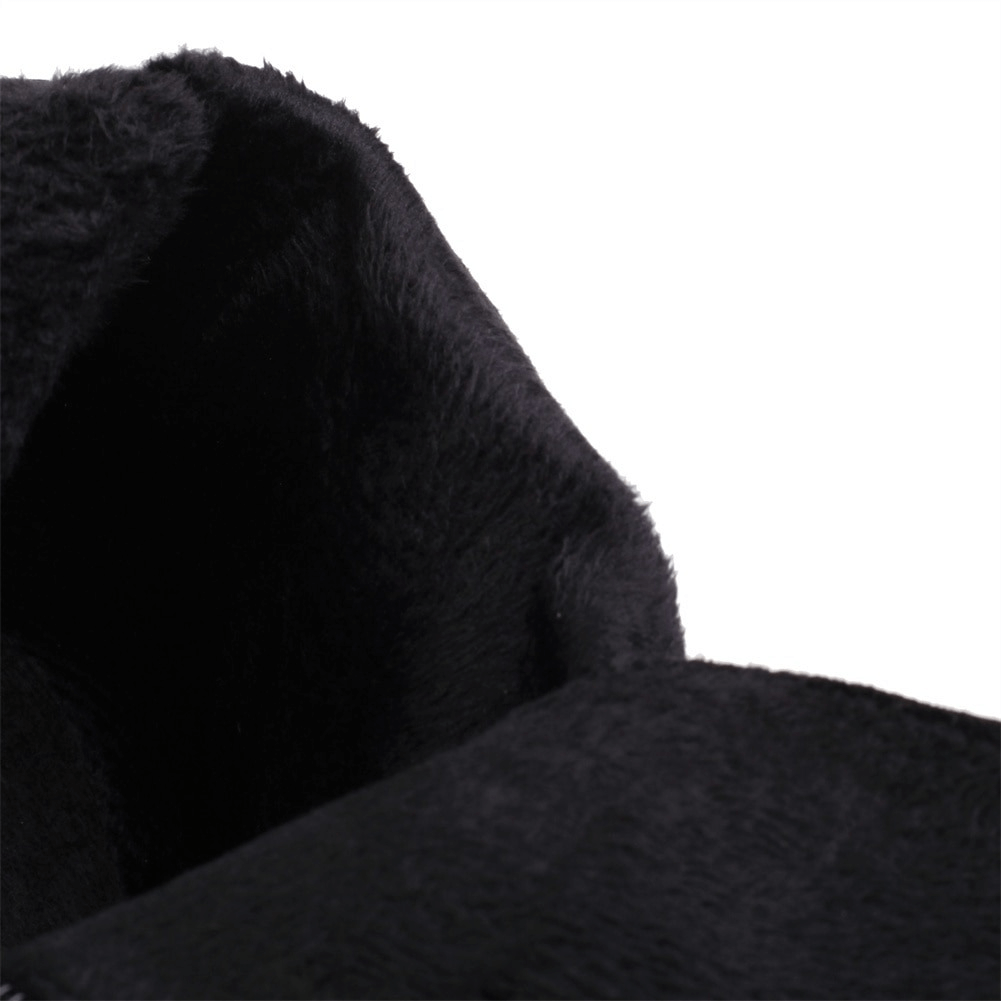 Interior view of soft black fabric in stylish women's goth ankle boots.