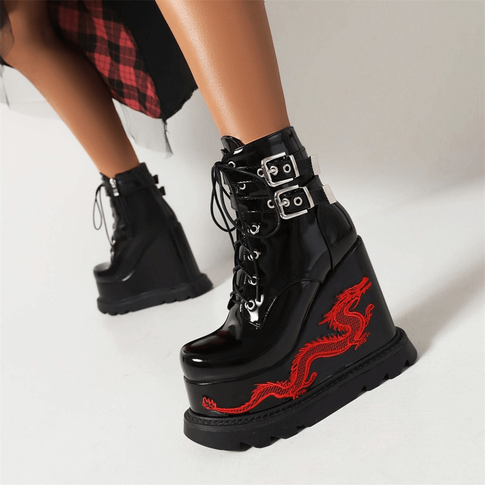 Gothic women's high heel wedge boots featuring striking dragon embroidery and stylish buckles.