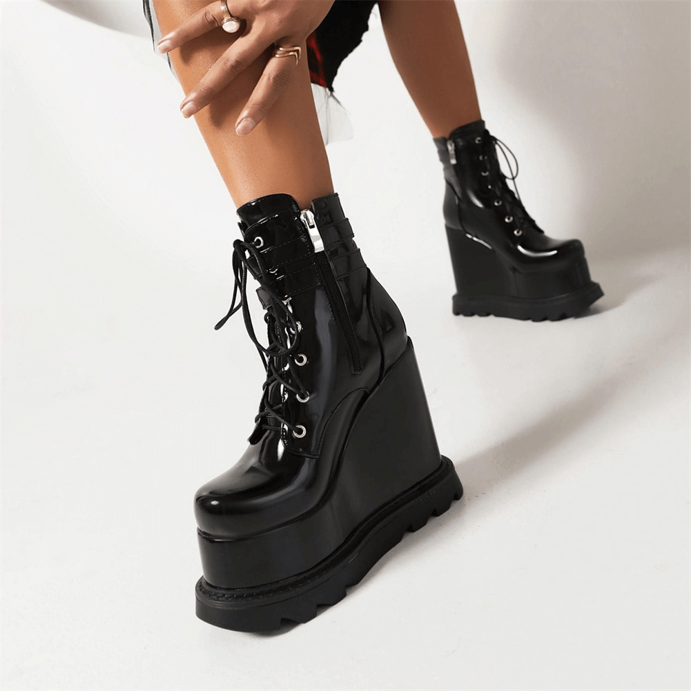 Fashionable women's gothic high heel wedge boots with dragon embroidery and lace-up design.