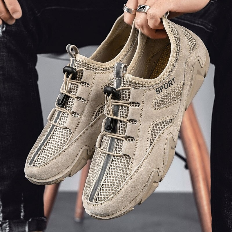 Men's breathable casual shoes in beige with mesh inserts and comfortable lacing for sporty style.