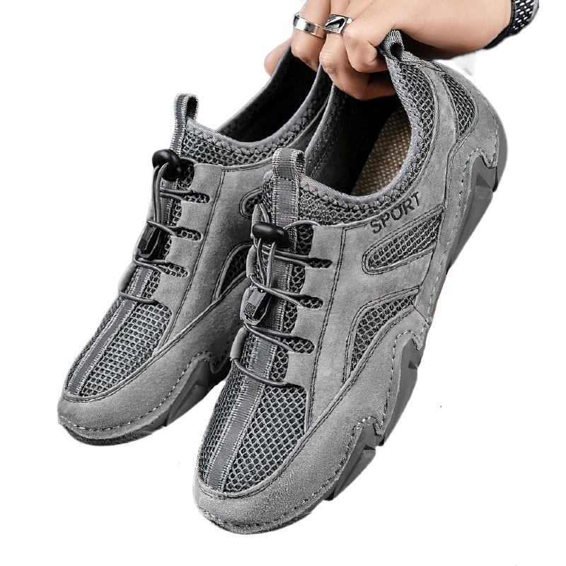 Men's casual flat sneakers in grey with mesh inserts for breathability and comfort.