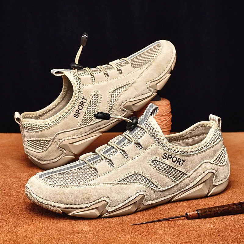 Men's breathable casual shoes with mesh inserts and sporty design, perfect for comfort and style.