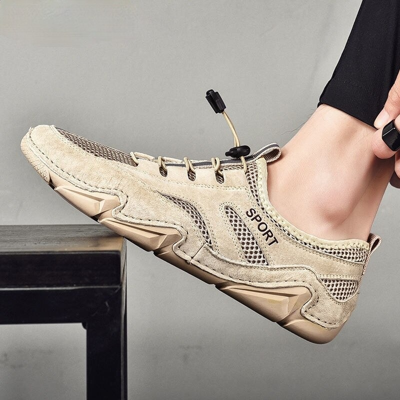 Men's breathable casual sneakers with mesh inserts and quality sole, perfect for sports and comfort.