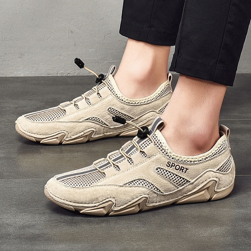 Men's breathable casual shoes with mesh inserts and sporty design in light color.
