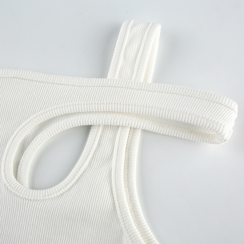 Close-up of a stylish women's white tank top with a unique cut and sleeveless design, perfect for casual summer outfits.