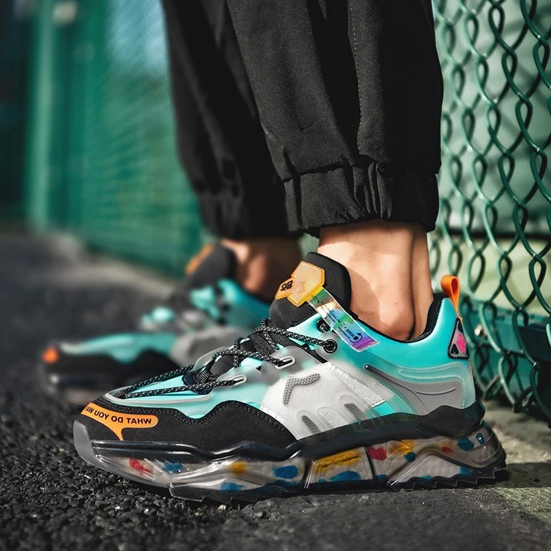 Colorful chunky breathable sneakers on a stylish casual outfit, perfect for sport and running.