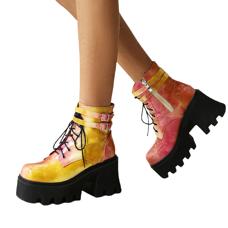 Colorful women's ankle boots with chunky heels in pink and yellow, perfect for alternative street style.