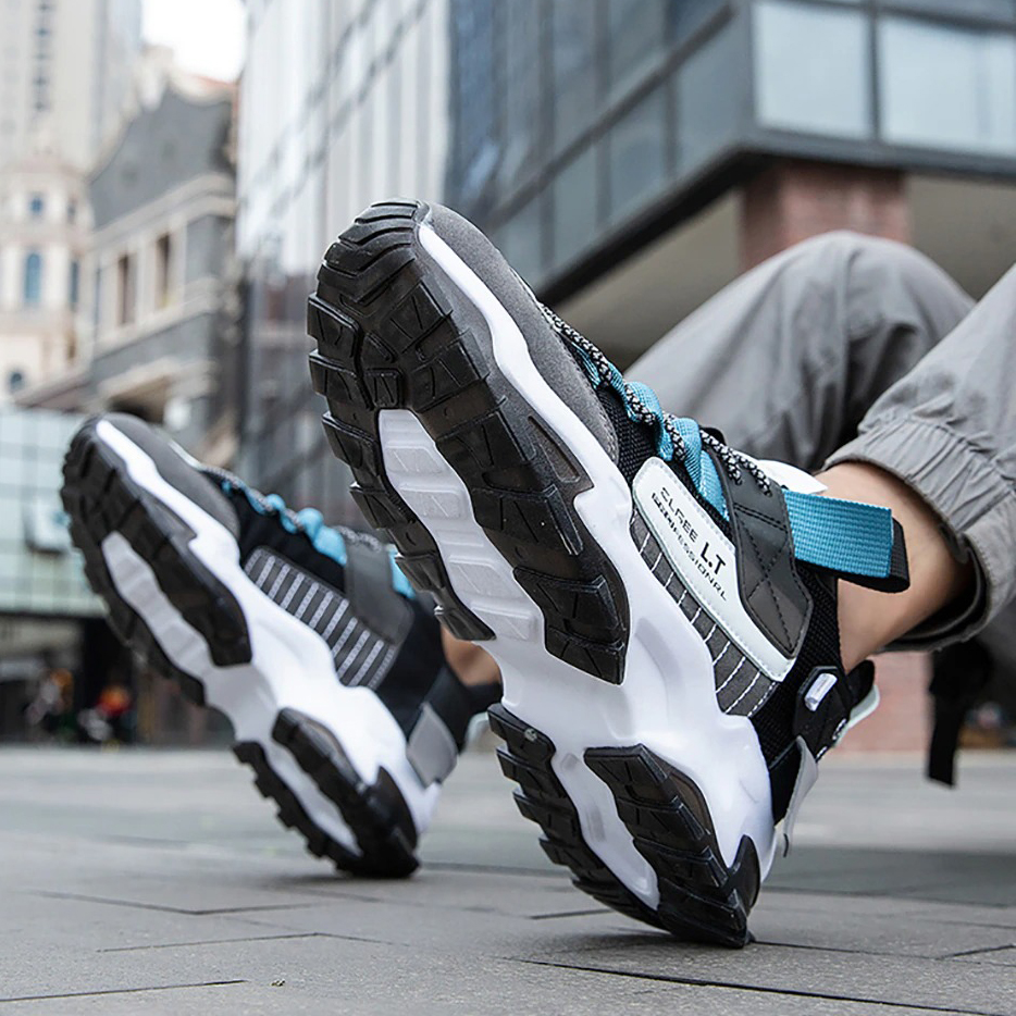 Men's breathable sneakers in black and blue, showcasing flexible soles for casual sport and running, perfect for everyday wear.