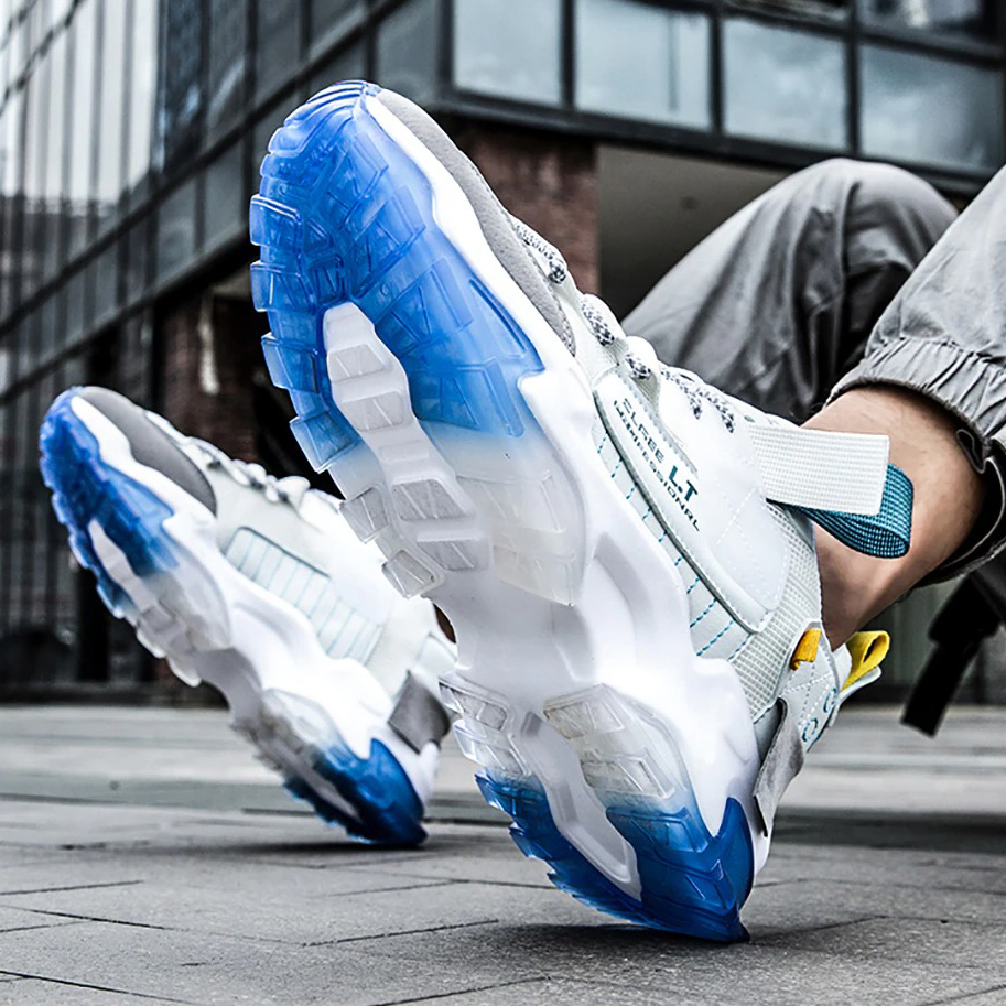 Stylish breathable sneakers with a flexible sole, perfect for casual wear and running, showcasing blue and gray design.