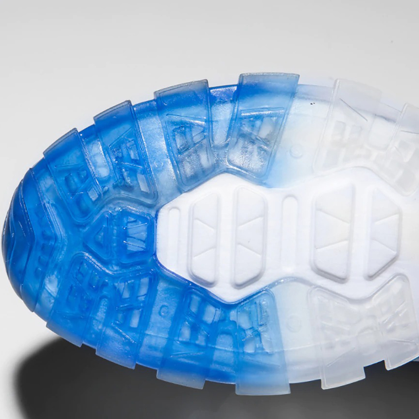 Sole of breathable sneakers featuring a blue gradient design, ideal for casual sport and running activities.