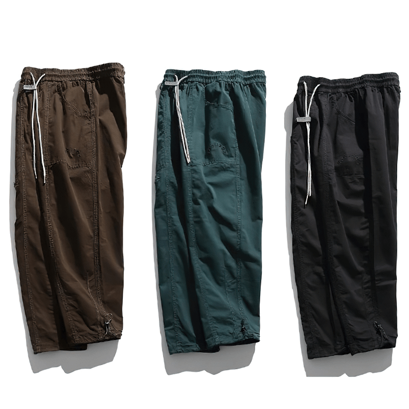 Fashionable drawstring harem cargo pants in brown, teal, and black for a casual stylish look.