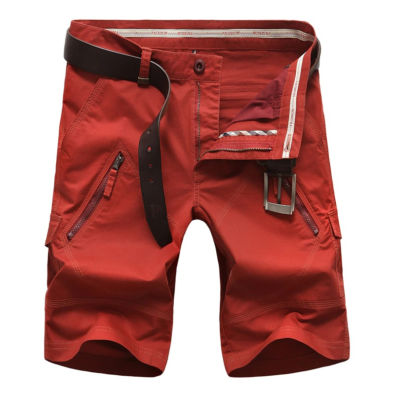 Men's red cotton cargo shorts with multi pockets and a belt, perfect for casual summer outings.